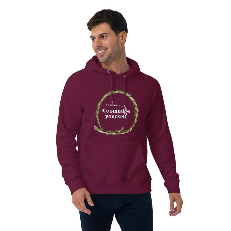 White man wearing a red hoodie that says respectfully go smudge yourself